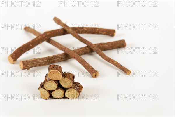 Group of sliced natural licorice roots isolated on a white background