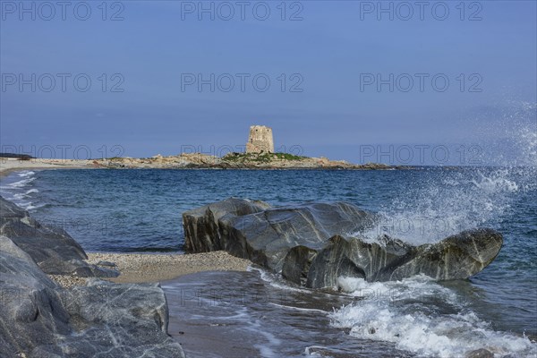 Pedal boats on the beach in front of the Torre di Bari Sardo