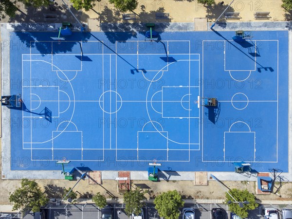 Aerial vision of blue outdoor basketball court