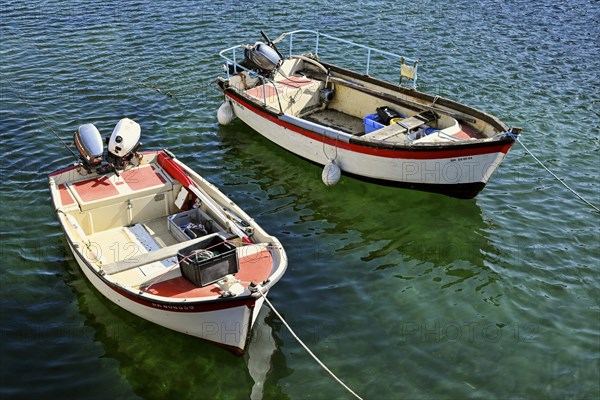 Two boats with outboard motors