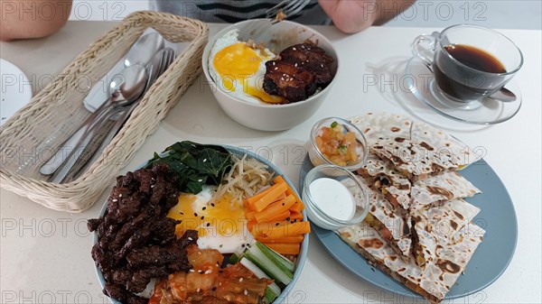 Overhead view of a man getting ready to eat