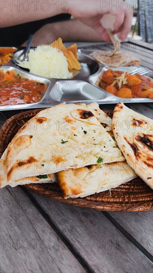 Tourist foodie eating vegetable curry or tarkari