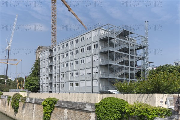 Housing containers at the Notre Dame construction site after the fire