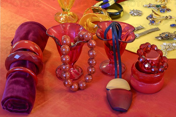 Various pieces of jewellery decorated on a table