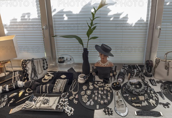 Rhinestone jewellery decorated in front of a window