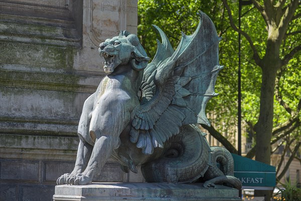 Fantasy figure at the Saint Michael Fountain by architect Gabriel Davioud