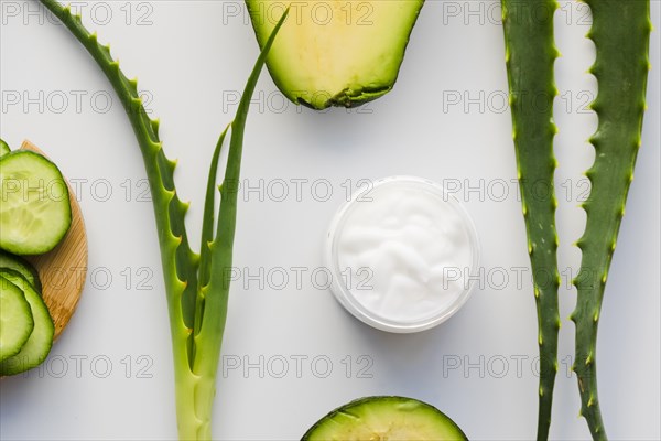 Aloe vera leaves with beauty cream bottle