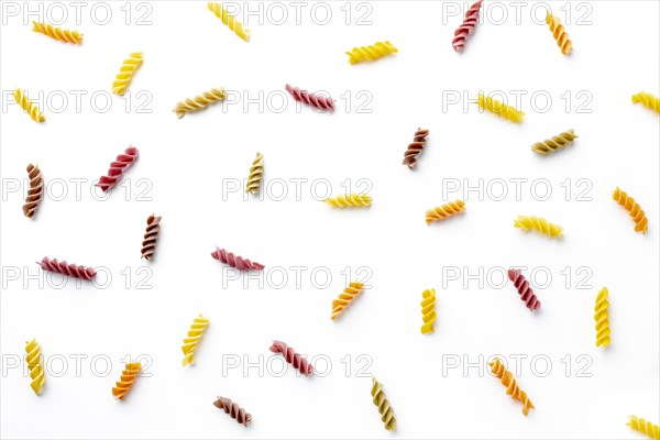 Arrangement uncooked colorful fusilli