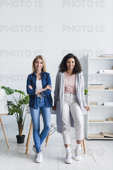 Attractive young women posing cabinet