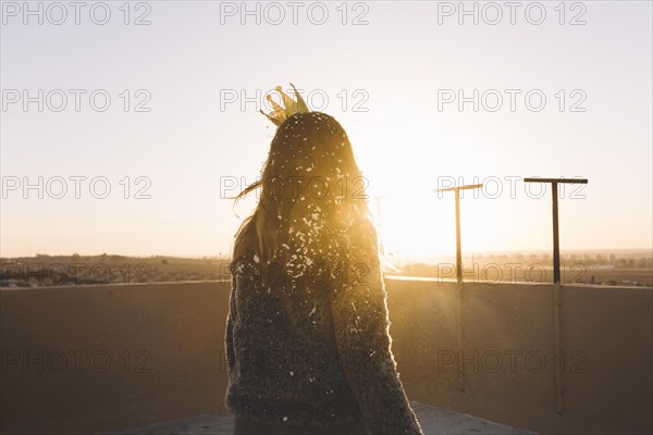 Back view girl roof