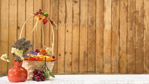 Basket with fruits flowers
