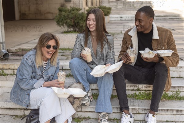 Best friends hanging out while enjoying cup coffee