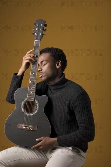 Black boy playing guitar 3