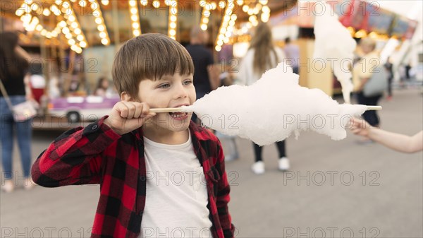 Boy enjoying cotton candy