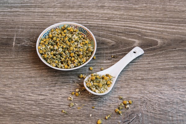 Ceramic bowl spoon with herbs