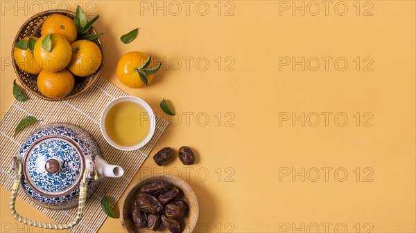 Chinese new year with tea pot mandarines