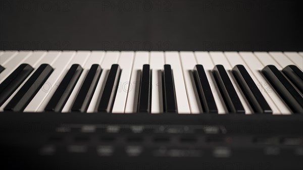 Close up beautiful digital piano with synthesizer