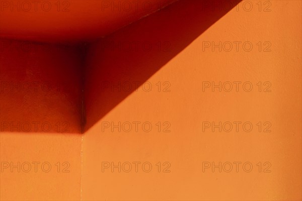 Corner orange wall copy space