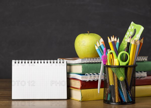 Education day arrangement table with notepad