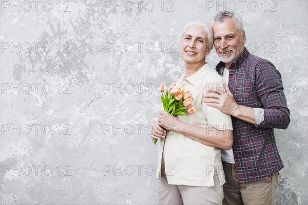 Elder couple posing