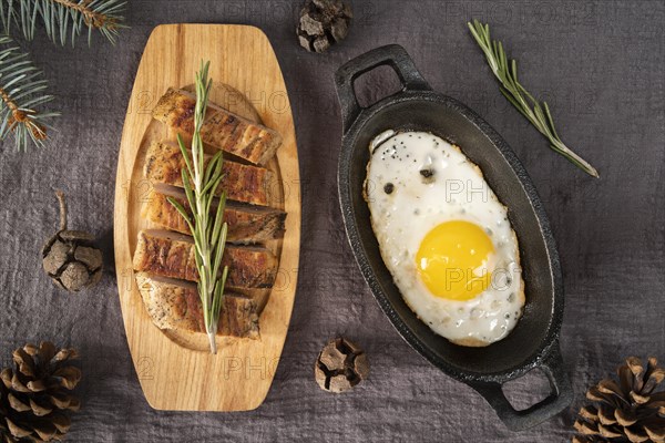 Flat lay arrangement with meat egg