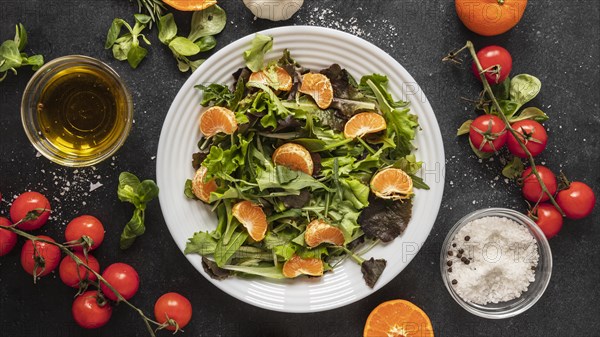 Flat lay food ingredients with salad plate