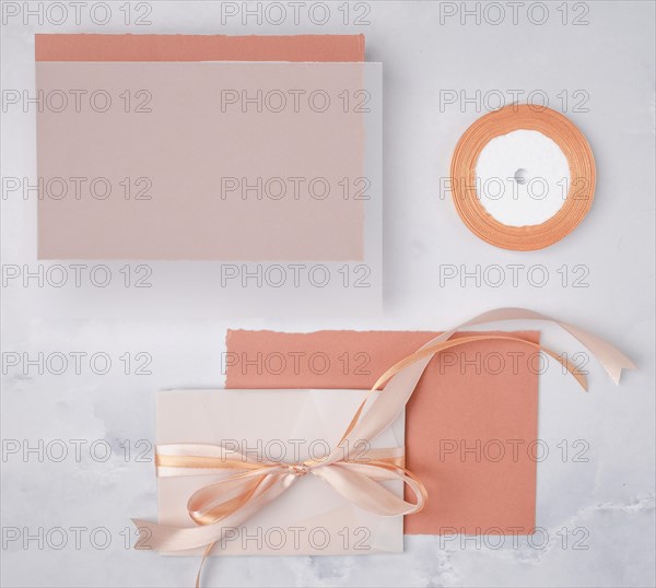 Flat lay wedding composition with minimalist invitations mock up