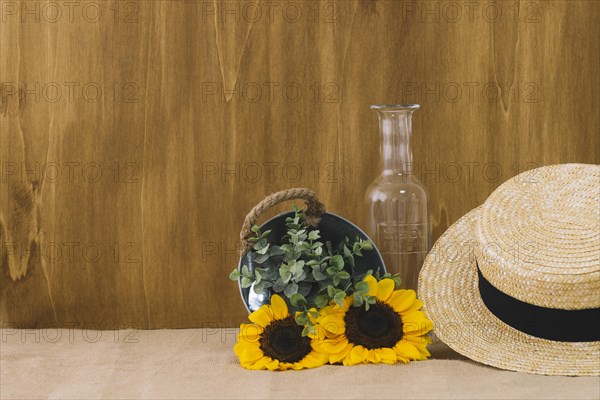 Flower composition with bucket hat