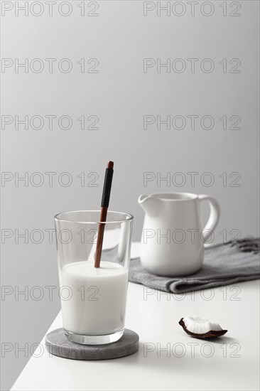 Front view glass milk with coconut