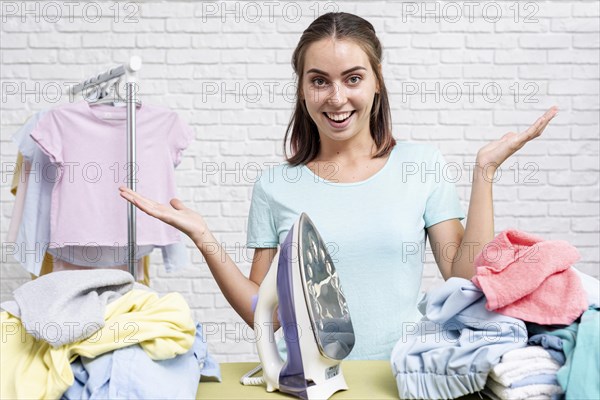 Front view woman ready ironing clothes