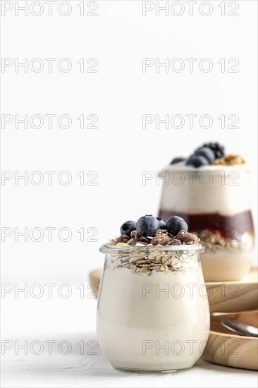 Front view yogurt mix with fruits oats jam