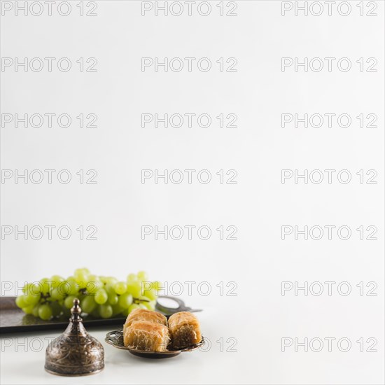 Green grape tray near baklava