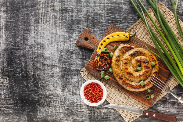 Grilled vegetable spiral sausage with red peppercorn