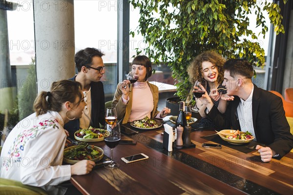 Group friends eating restaurant