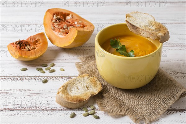 High angle tasty pumpkin cream soup