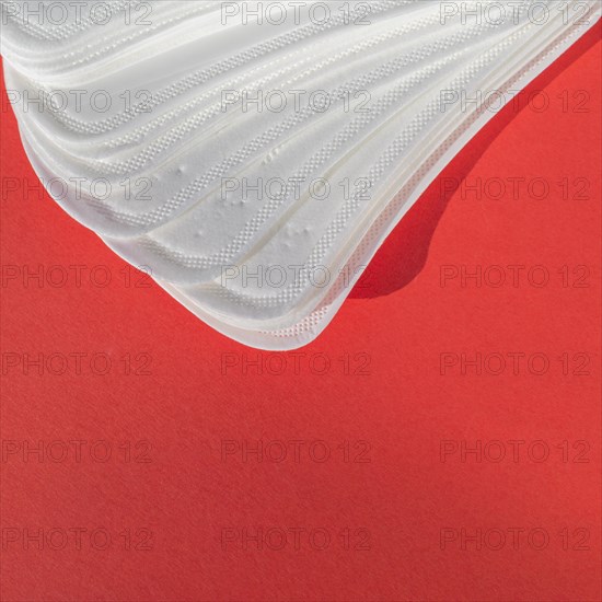 High view clean white pads red background