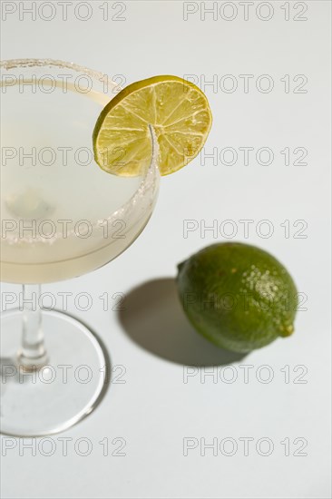 Homemade classic margarita drink with lime salt white background