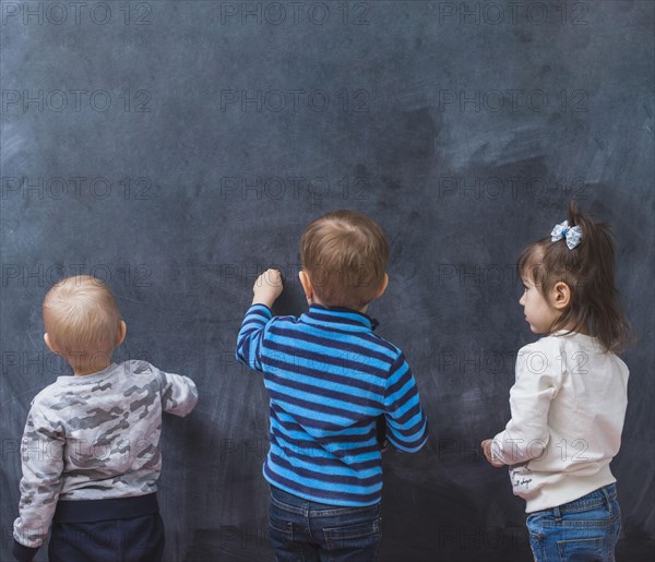 Kids drawing blackboard