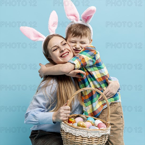 Little boy hugging his mom