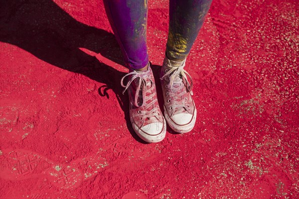 Low section woman s shoes with holi color powder