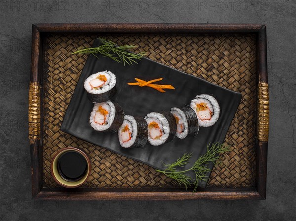 Maki sushi rolls black slate