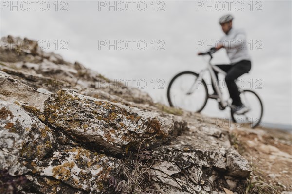 Man riding mountain bike safety equipment