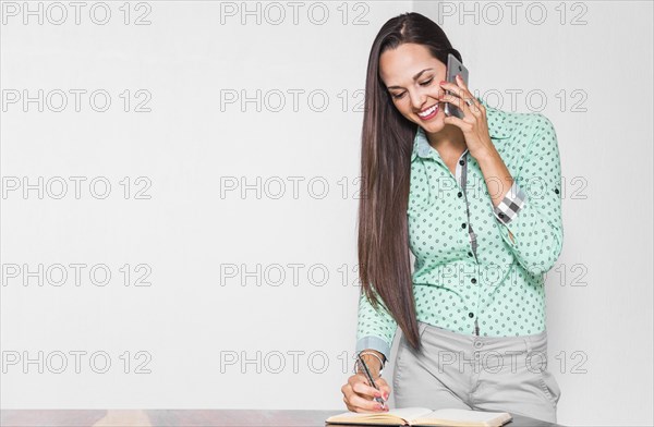 Medium shot woman doing her job office