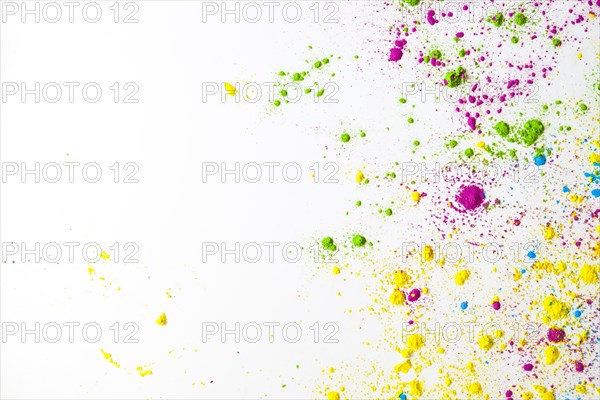 Overhead view colorful holi power white background