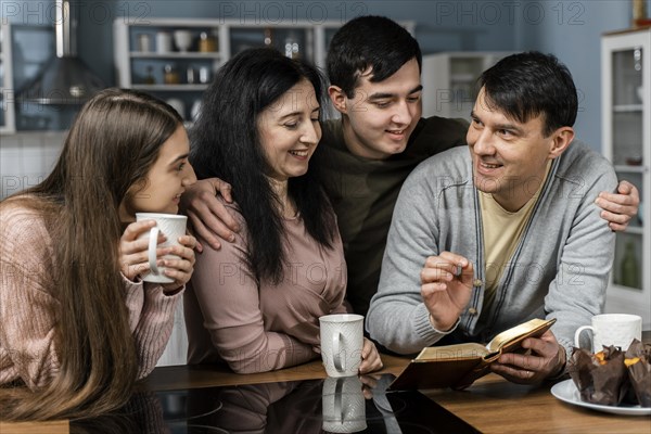 People reading from bible kitchen