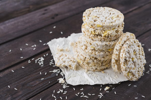 Pile puffed rice cakes brown wooden table