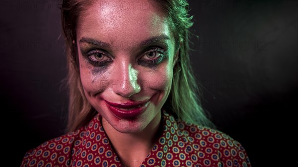 Portrait make up clown horror character looking camera
