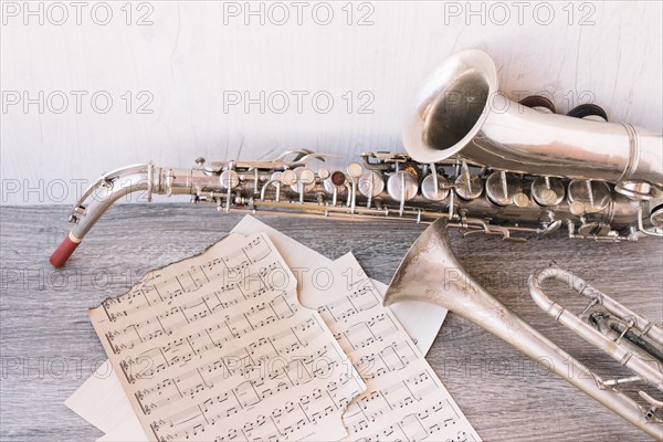 Sheet music near saxophone trumpet