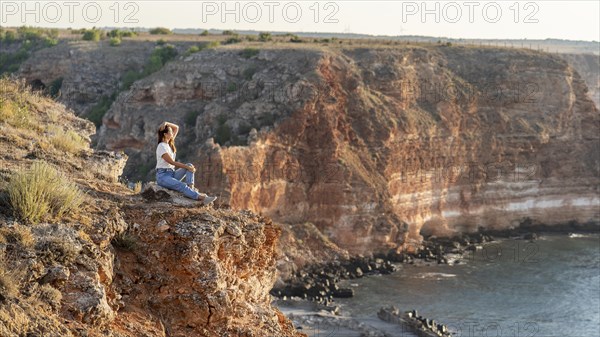 Side view woman enjoying view with copy space