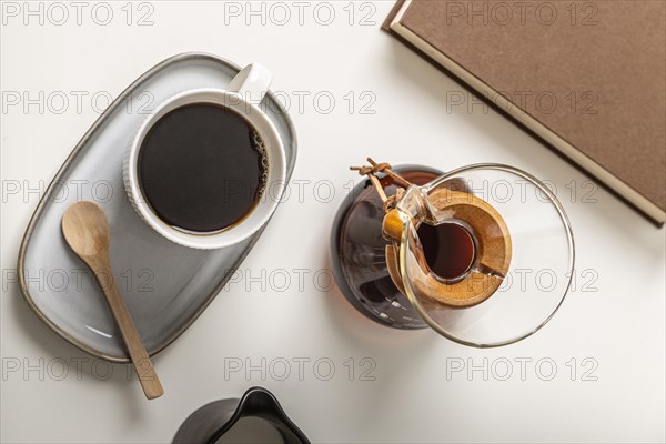 Top view coffee cup with chemex book